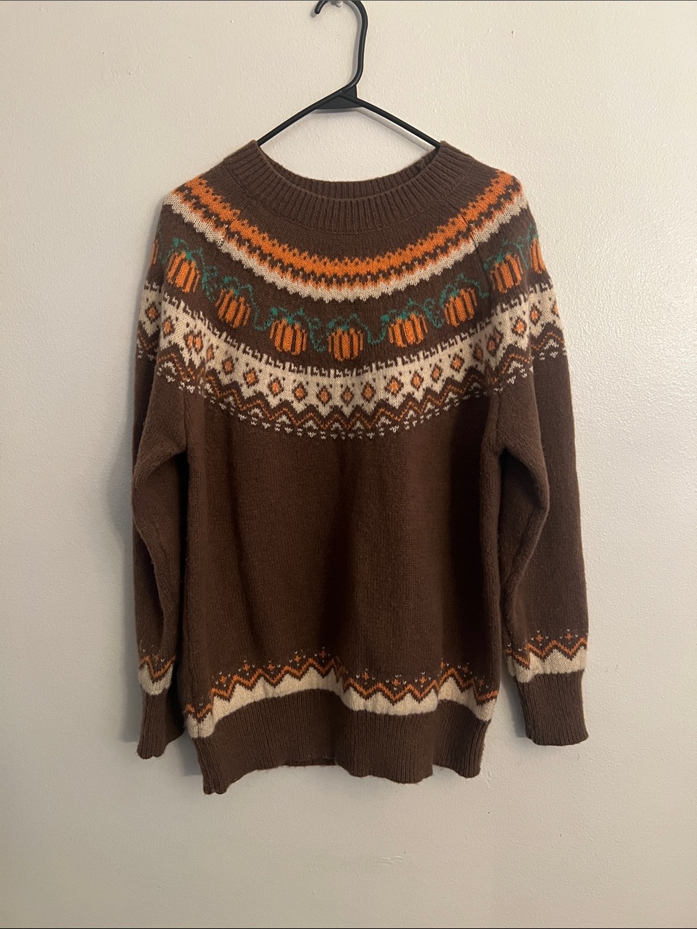 Woman’s comfy pumpkin sweater